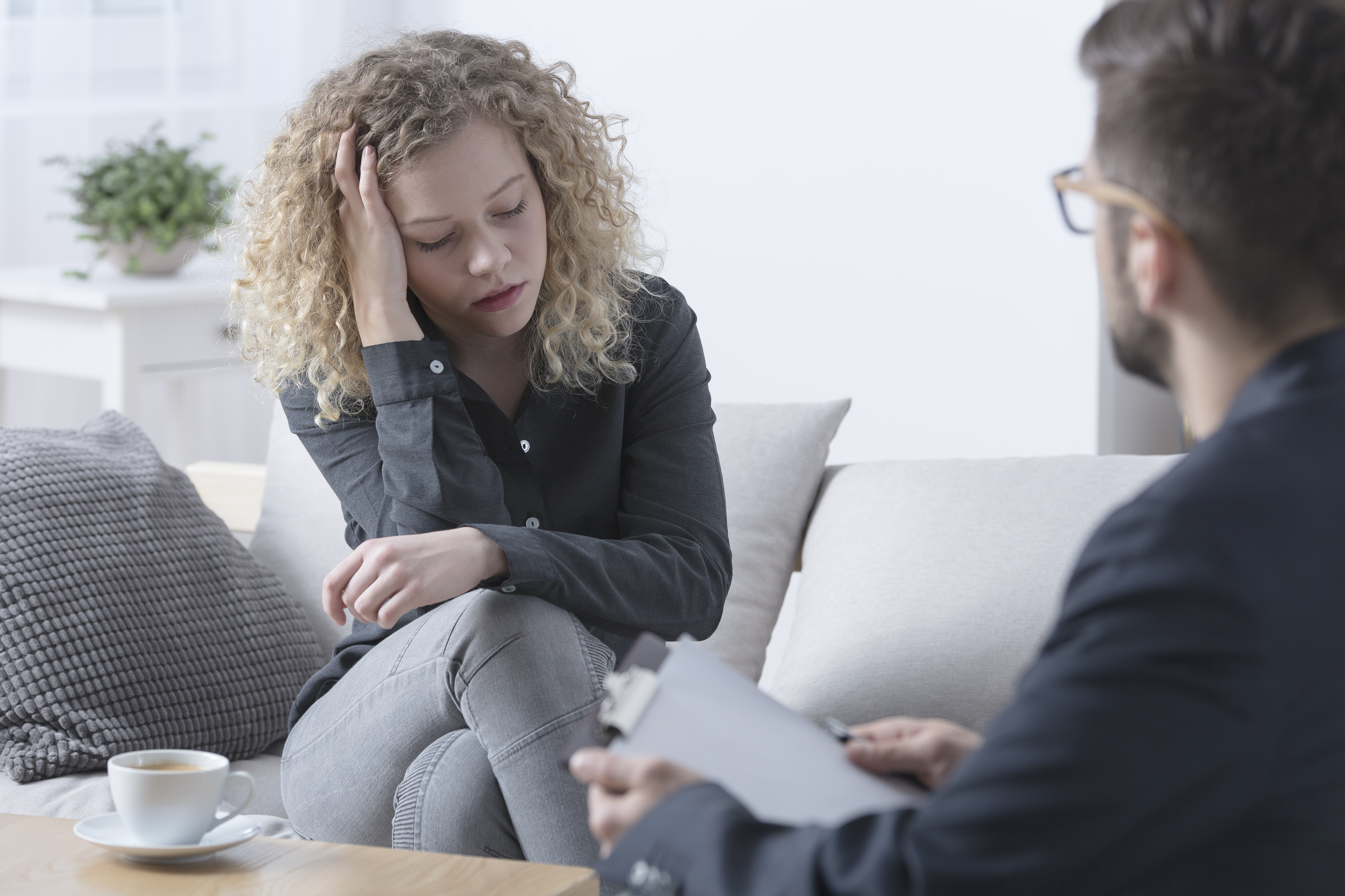 woman talking to therapist